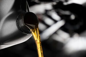 Oil being poured out of a container.